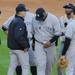 Yankees' pitcher CC Sabathia bows his head as he leaves the mound  after being taken out of the game in the bottom of the fourth during Game 4 of the ALCS against the Yankees at Comerica Park in Detroit on Thursday. 